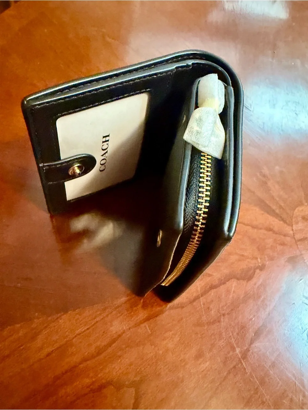 COACH Black Pebbled Leather Compact Bifold Wallet with Gold Logo